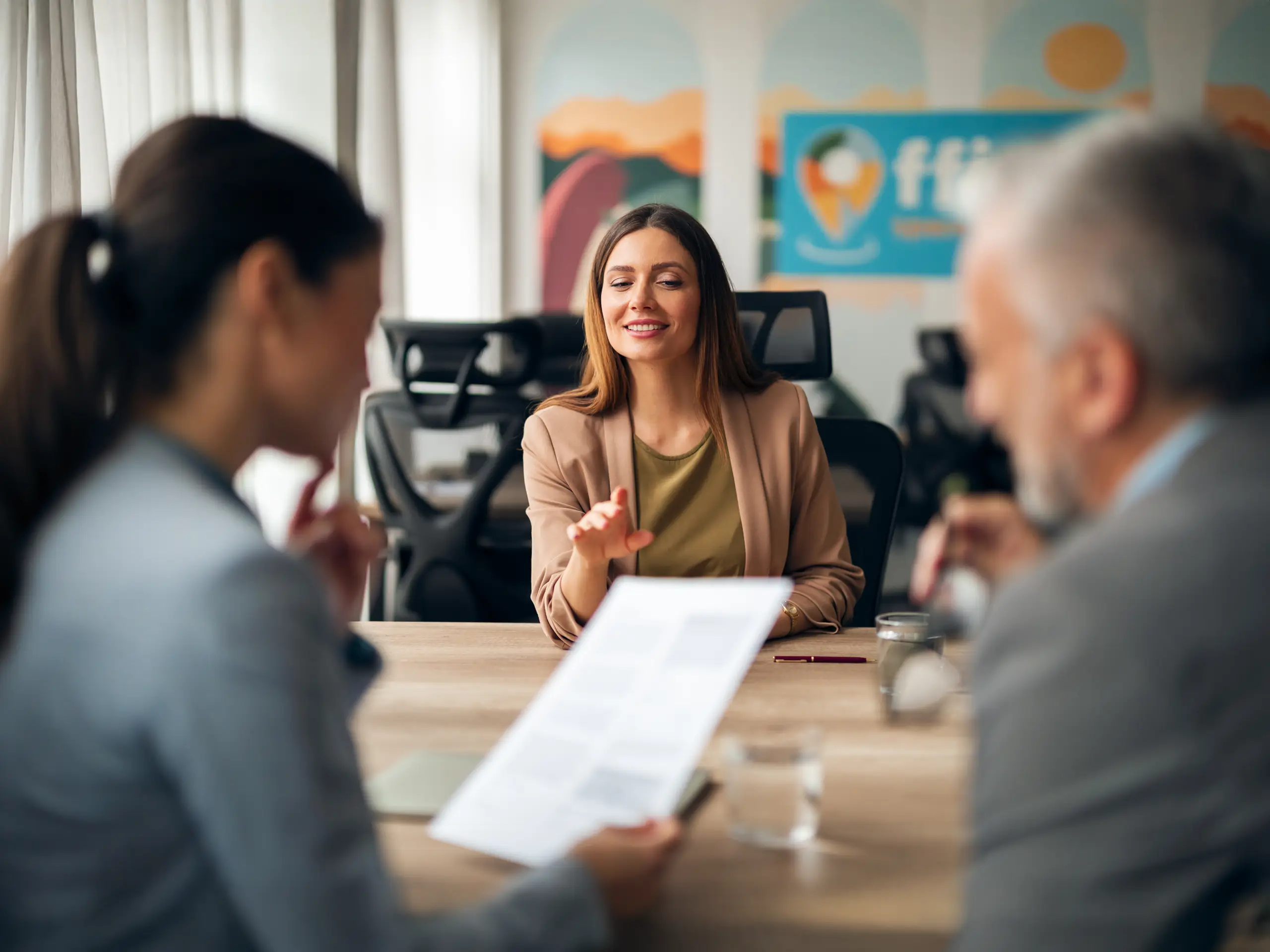business woman meeting clients, office