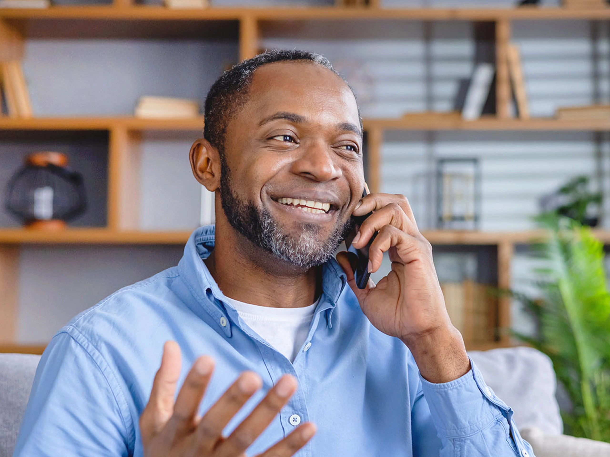 Man on the phone looking happy