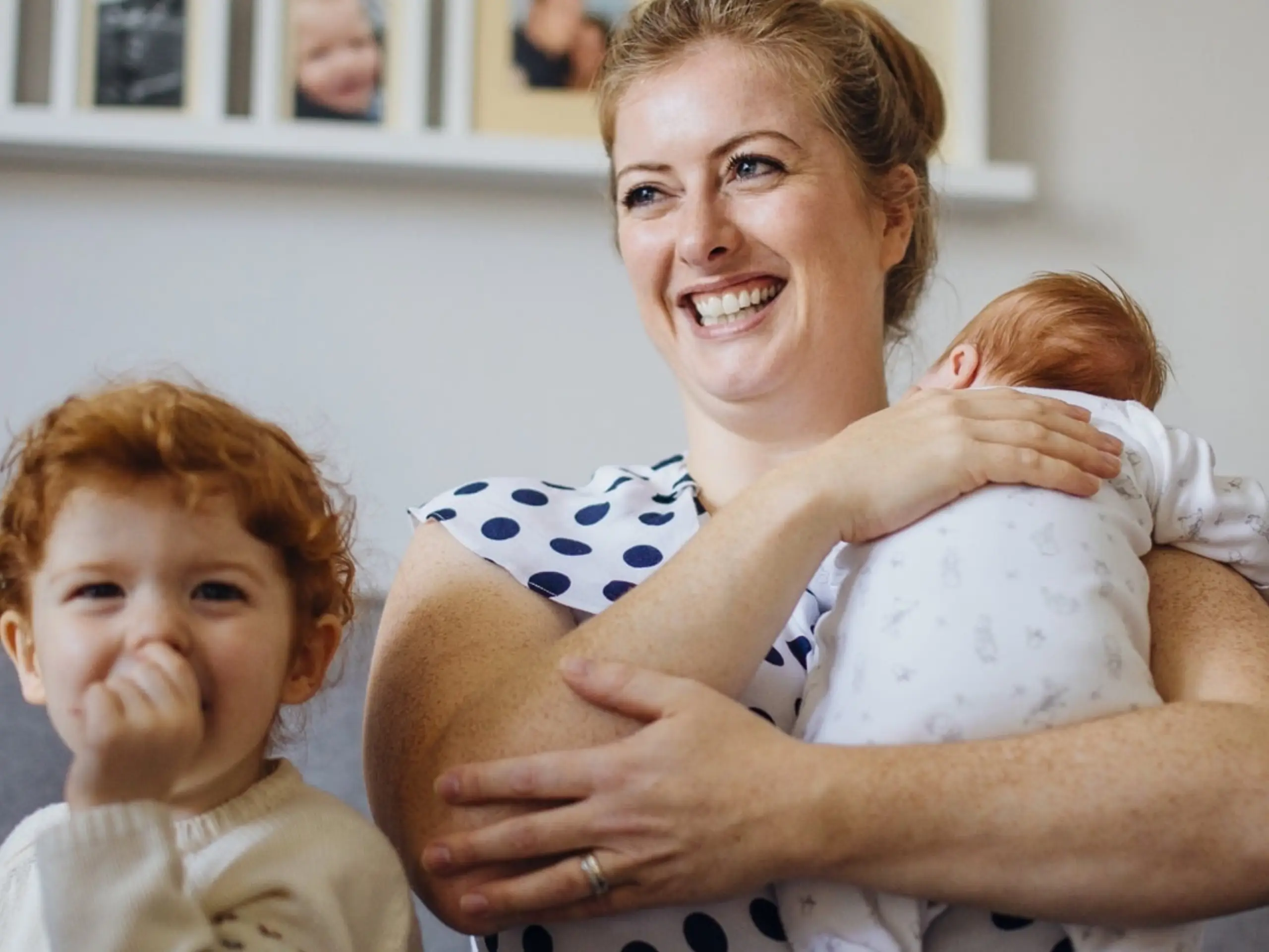 Smiling mother with her two children