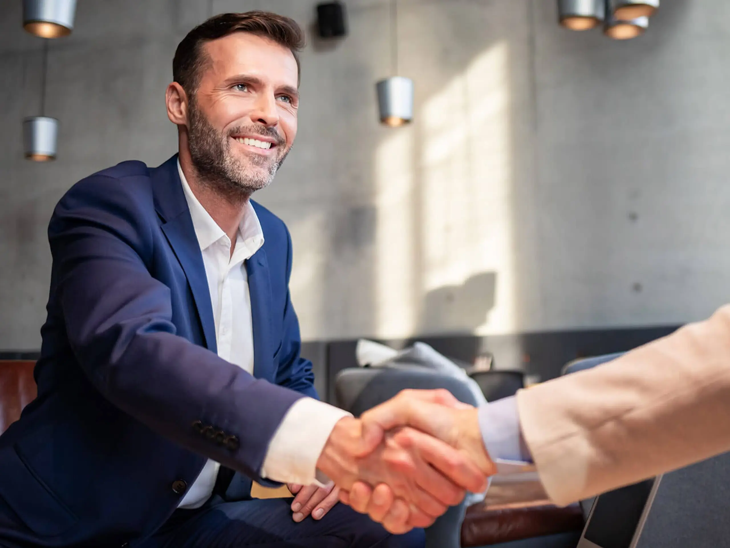 Two business men shaking hands