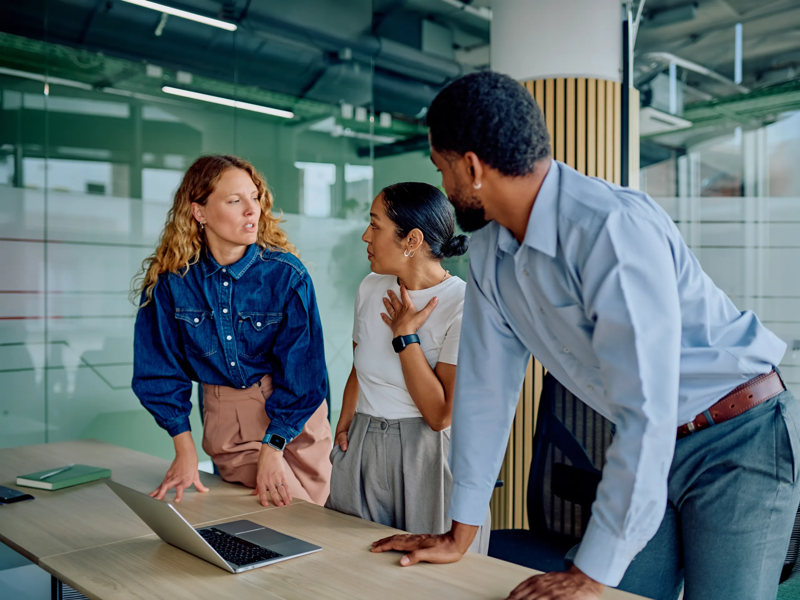 Colleagues talking at the office