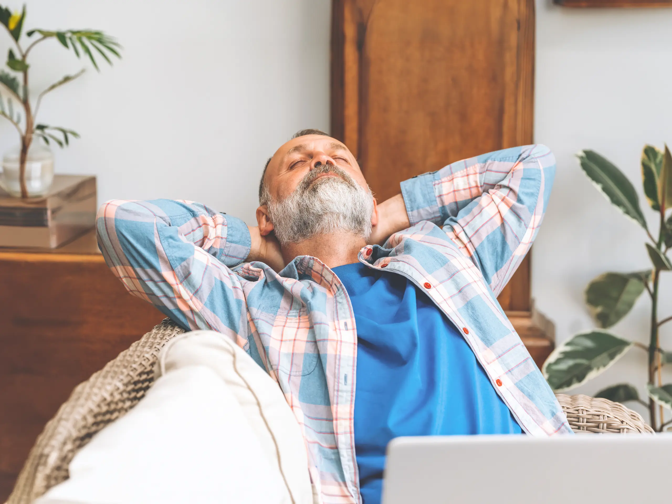 Caravan owner relaxing on his sofa