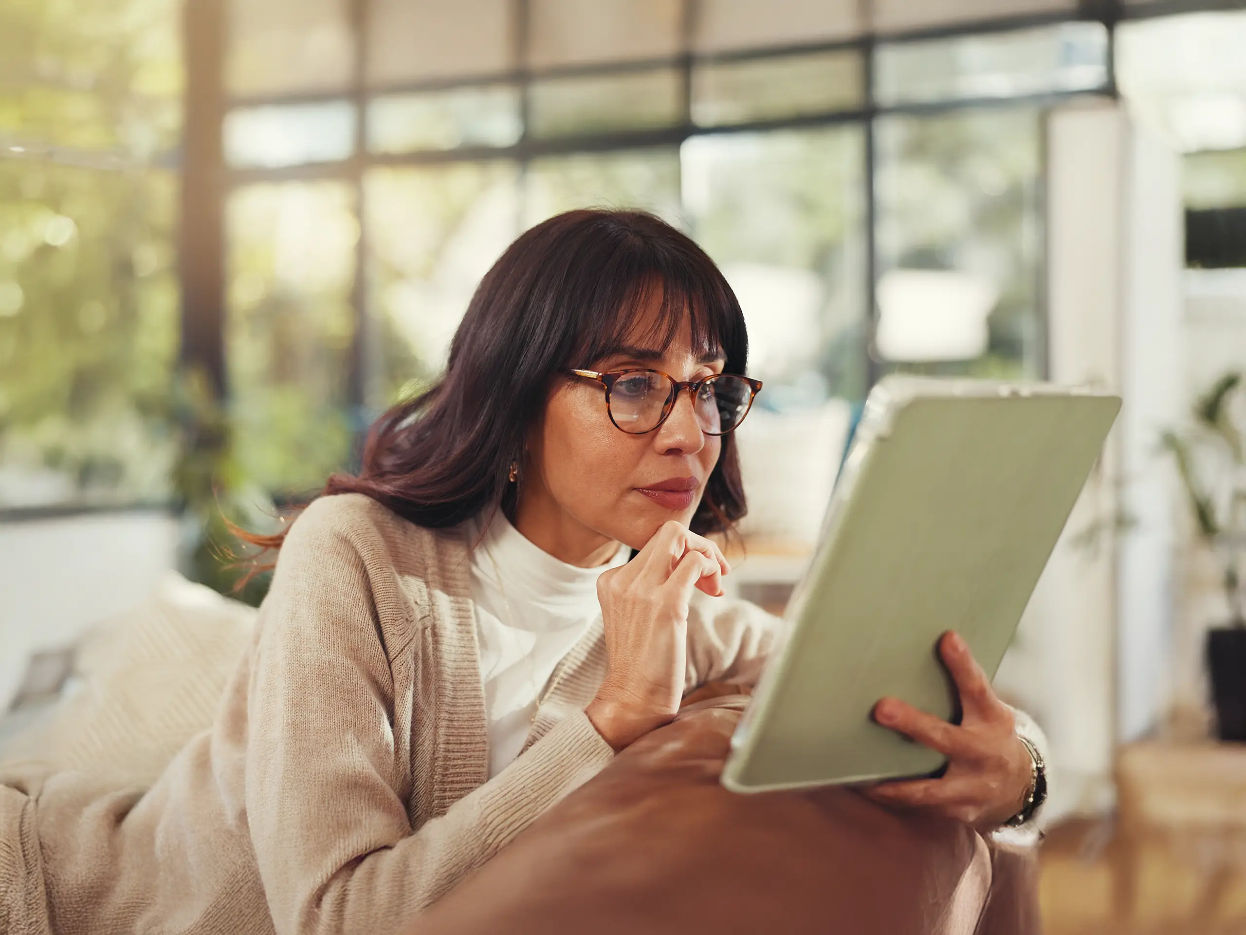 Women reading from a tablet