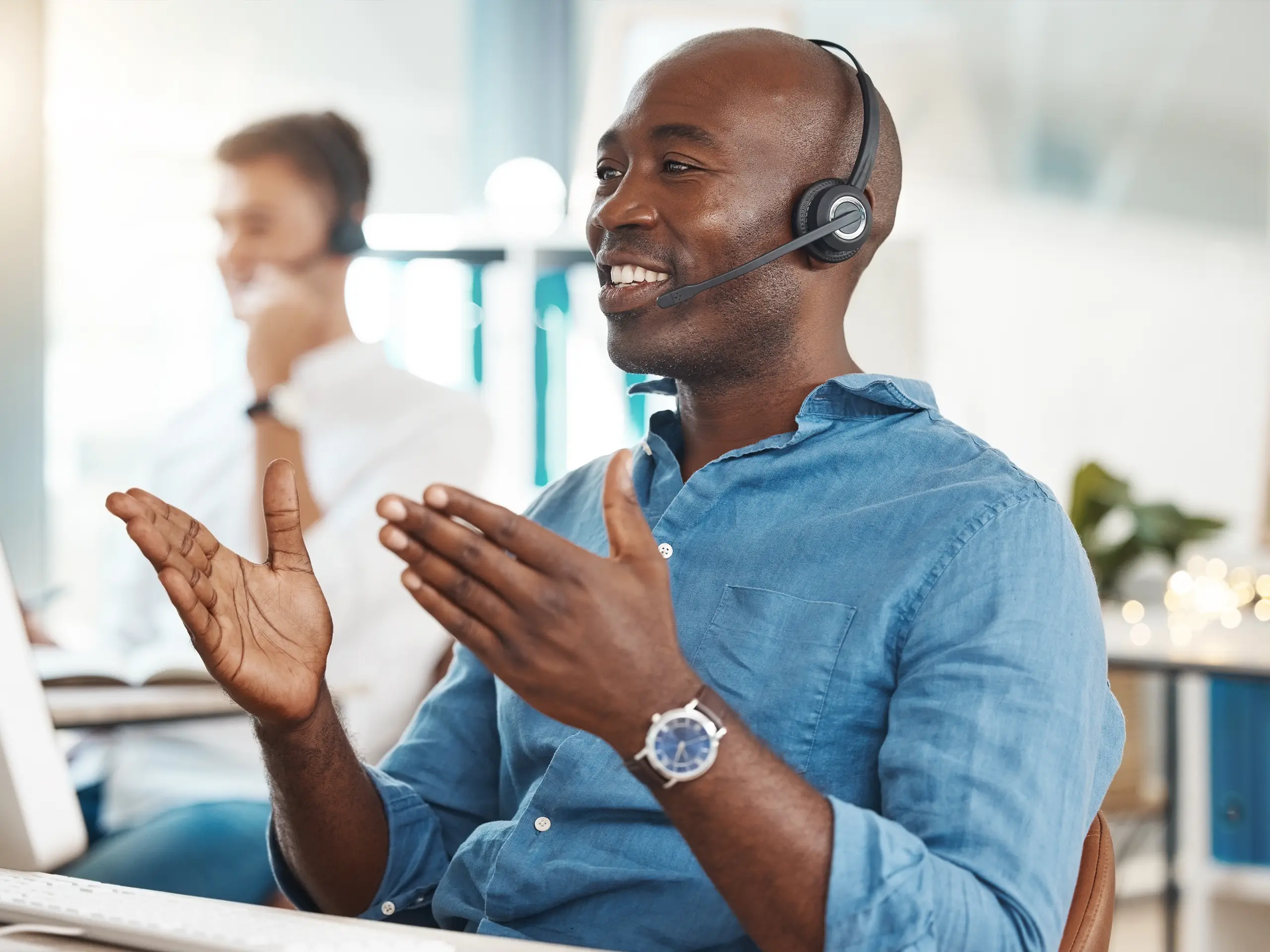 male with headset on talking to someone on the phone