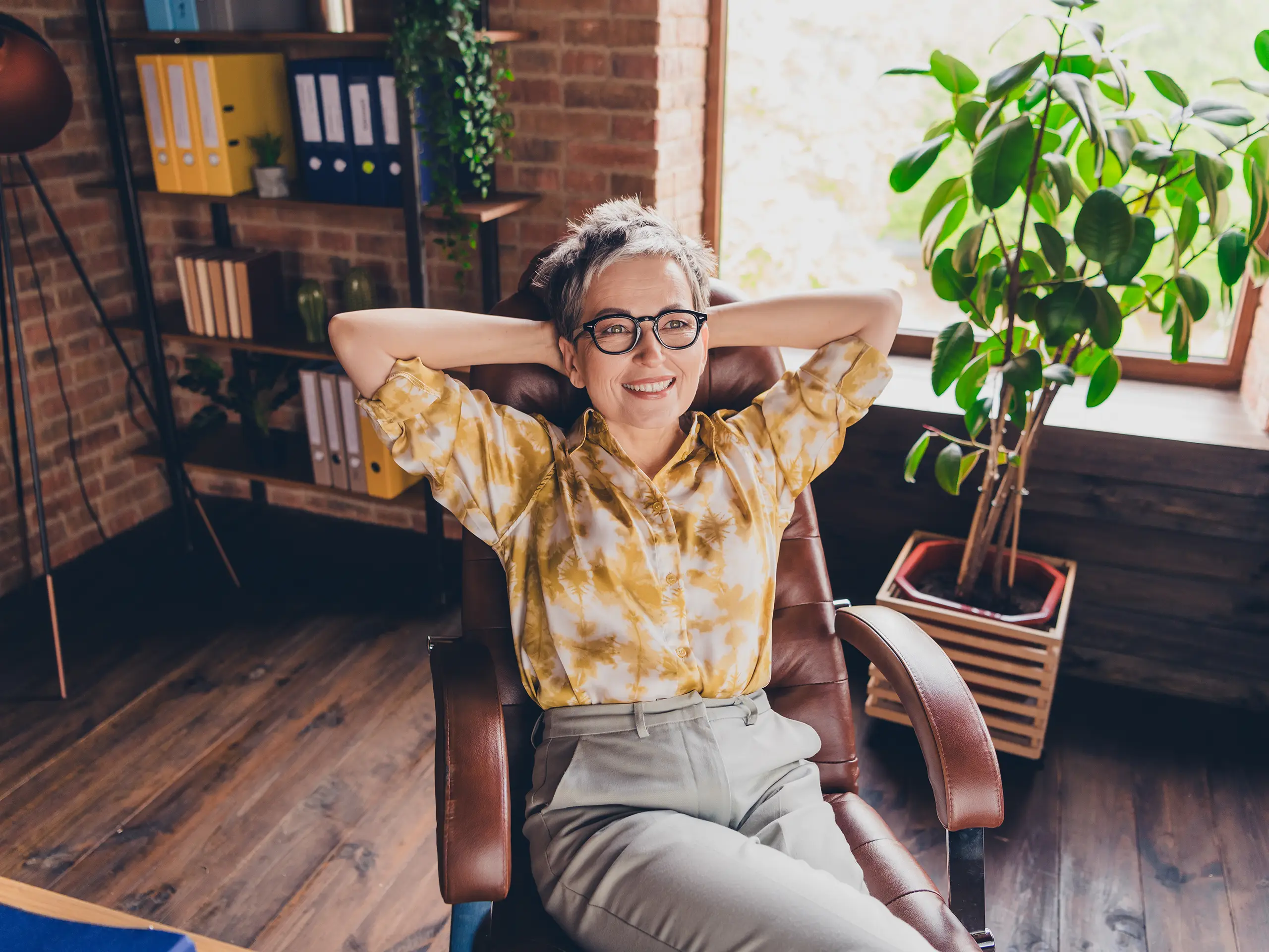 relaxed lady sat on armchair