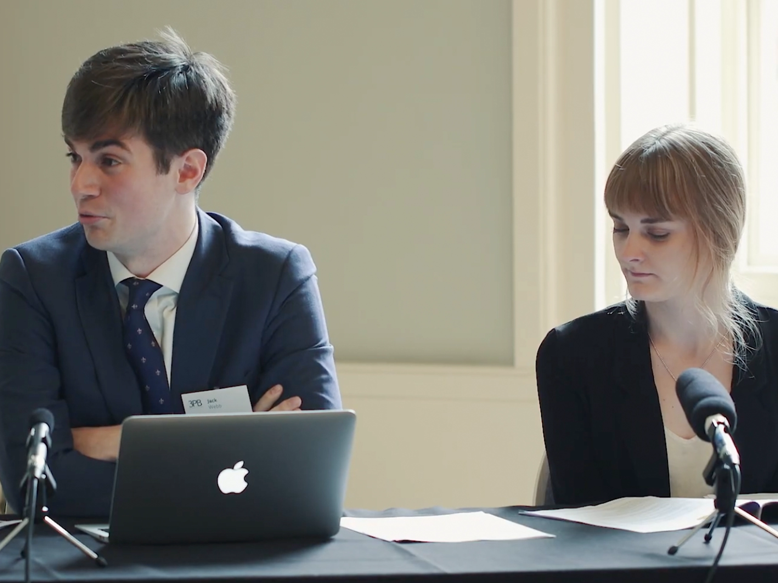Man and woman participating in mock trial
