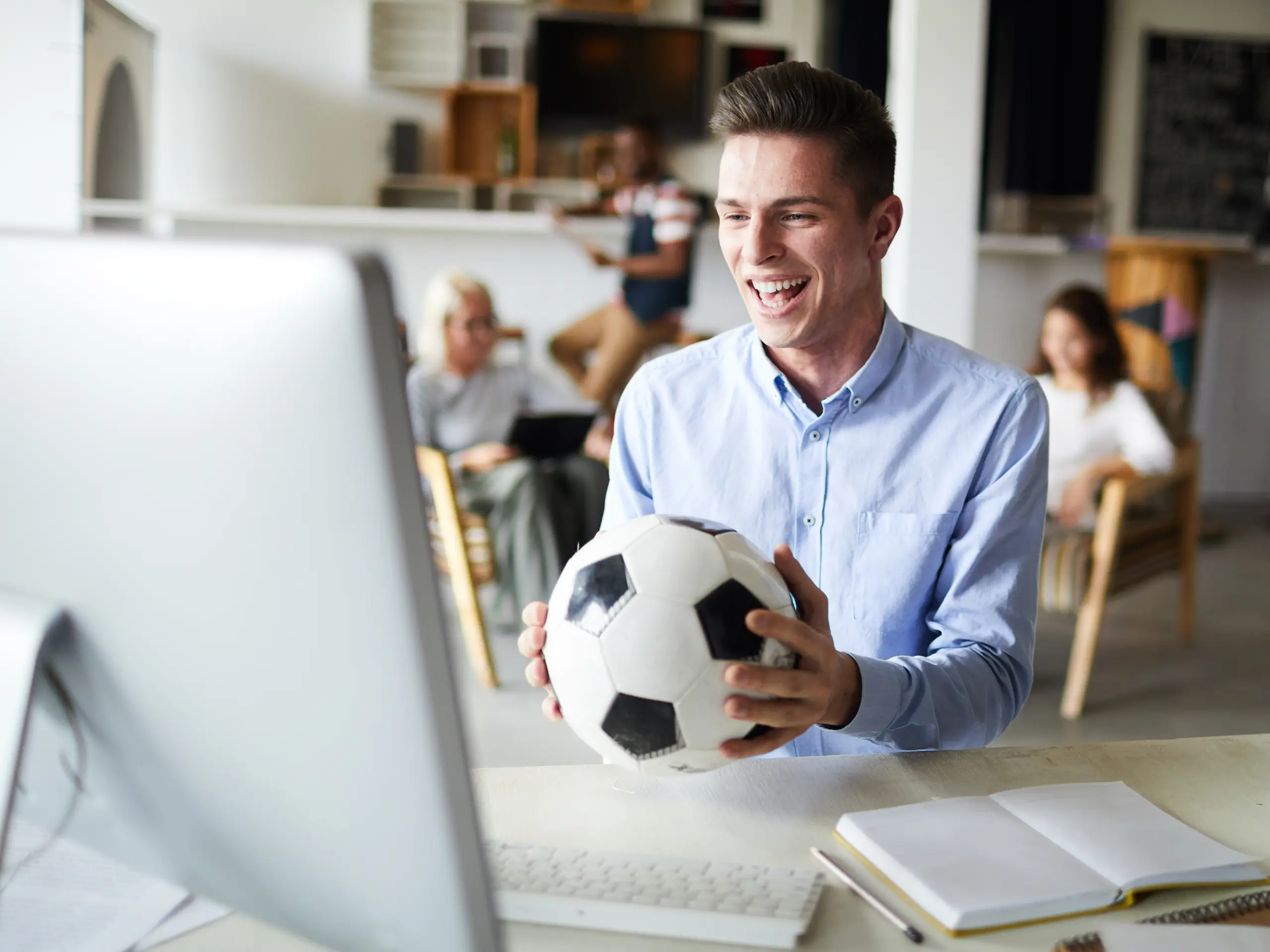 Watching football, office