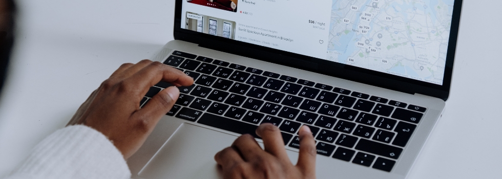 Airbnb A person using a laptop