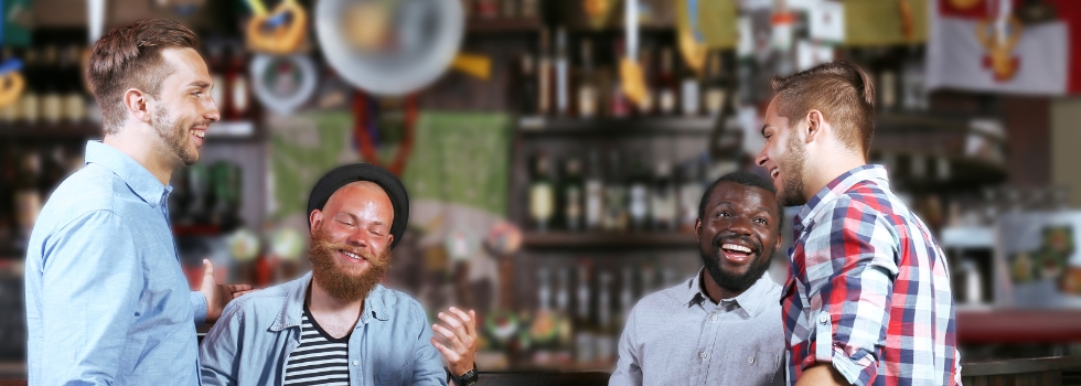 Men talking at a bar