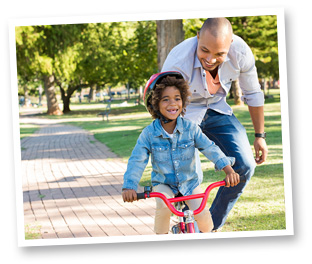 Family-legal-solutions Square child learning to ride a bike with father