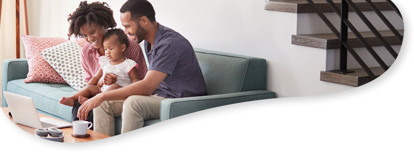 Family Legal Solutions 23 Happy family of three looking at a laptop